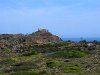 Le phare du cap de Creus apparaît au bout du chemin.